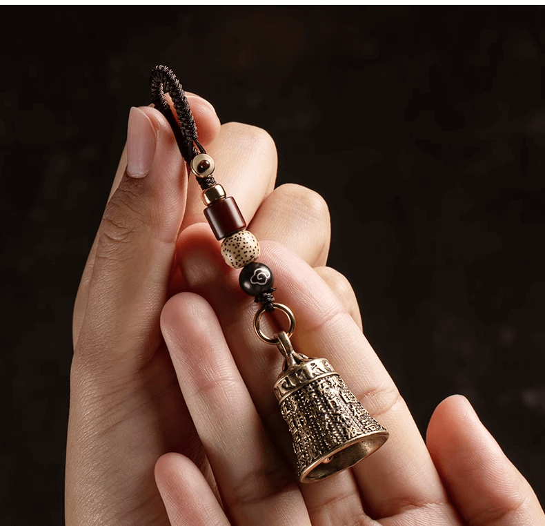 PRAJNA PARAMITA SUTRA Buddha Clock wind chimes Pendant held in hand, beautifully crafted with intricate details.